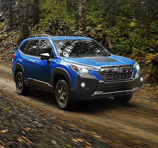 A 2022 Forester driving on a highway. | Zappone Subaru Norwich in Norwich NY