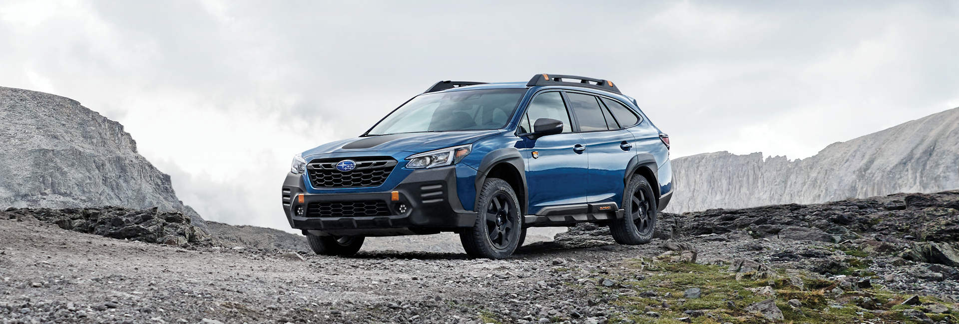 A 2023 Outback Wilderness parked in the mountains. | Zappone Subaru Norwich in Norwich NY