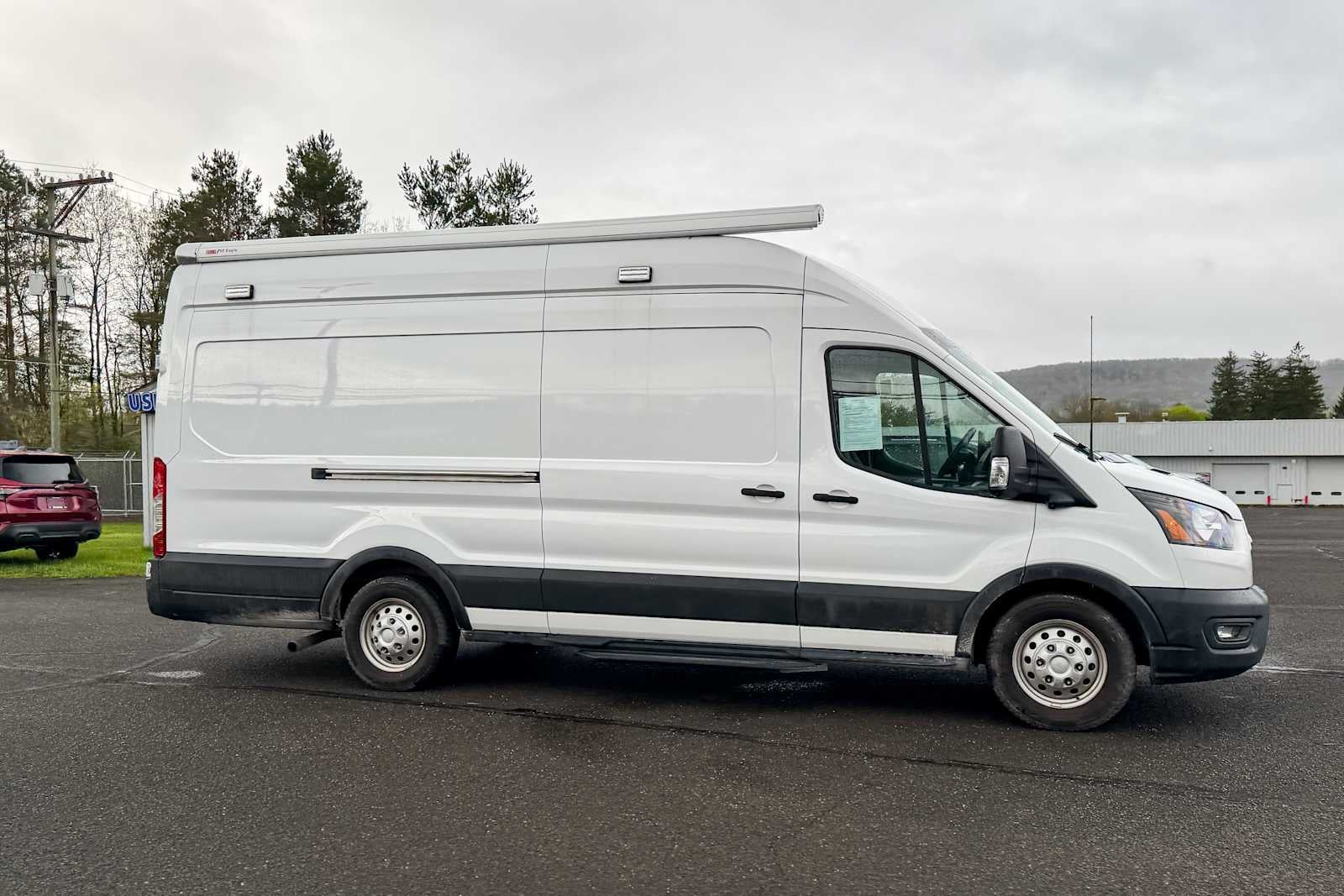 2023 Ford Transit Cargo Van T-350 148" EL Hi Rf 9500 GVWR AWD